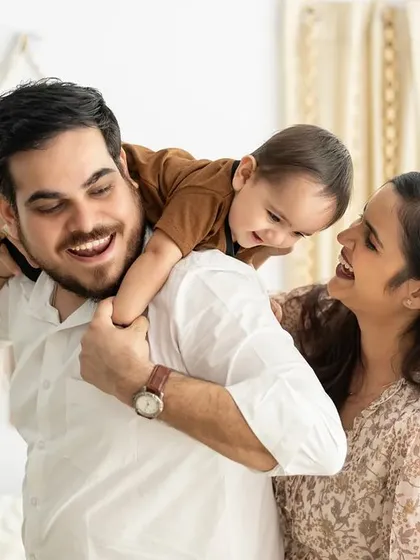 Sometimes the best moments are the unposed ones. We encourage playful interactions to capture the authentic laughter and connection that defines your family.