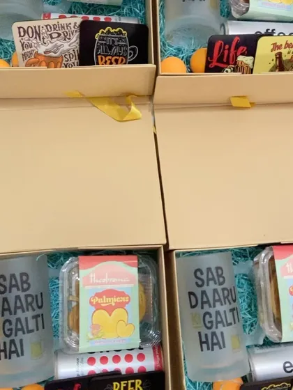 A peek inside our quirky Oktoberfest hampers. We included fun items like beer-themed coasters and mugs with the phrase 'Sab Daaru Ki Galti Hai' (It's all the alcohol's fault).