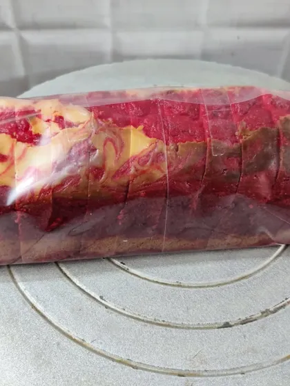 A close-up of my Red Velvet loaf cake, showing its vibrant color and soft texture. It has a hint of cocoa and the classic red velvet flavor you love, in a convenient loaf form.