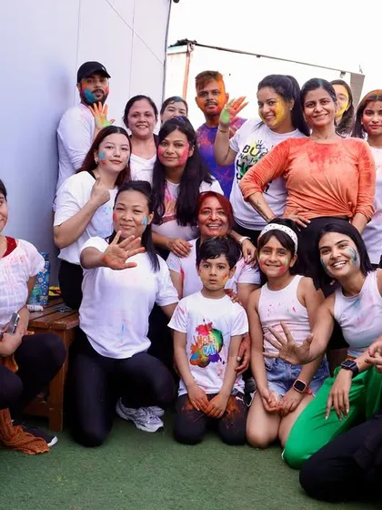 So much fun during our Holi celebration! The gym was filled with colors and laughter.