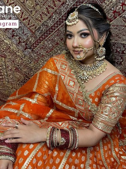This pose highlights the intricate embroidery of the lehenga. A great makeup artist understands how their work fits into the overall fashion statement.