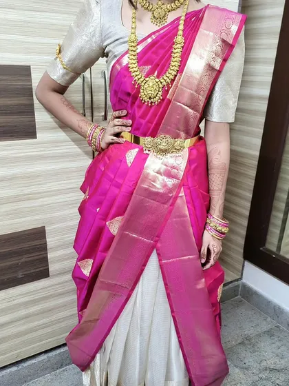 A confident pose in a butterfly drape. The style is bold and fashionable, perfect for someone who wants to stand out.