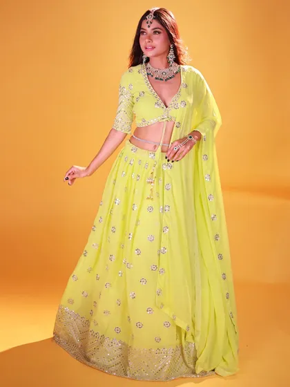 A great example of my studio work. The goal here was to make this modern, neon green lehenga pop against a solid yellow background, focusing on clean lighting to highlight the outfit's details and the model's presence.