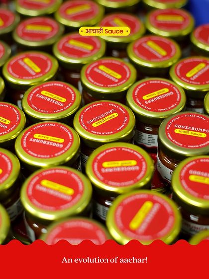 Jars of our Aachari Chunda Sauce, freshly packed and ready to go. Each batch is a testament to our blend of tradition and innovation.