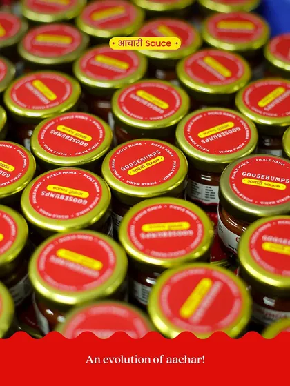 Jars of our Aachari Chunda Sauce, freshly packed and ready to go. Each batch is a testament to our blend of tradition and innovation.