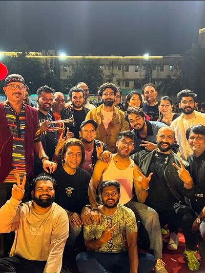 A group photo with Mithoon sir and the entire team after a fantastic show. The energy and camaraderie are what make these concerts so special.