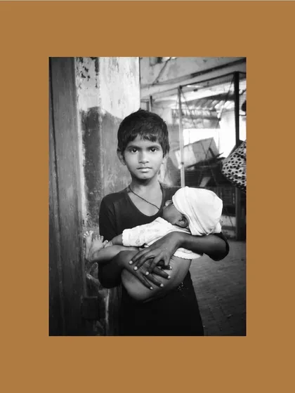 A powerful black and white portrait from the "Inheritance" exhibition, demonstrating the talent of the young participating photographers.