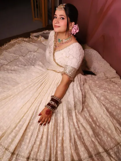 A full view of the designer rental lehenga. We provide a complete solution for brides, from makeup and hair to the perfect outfit.