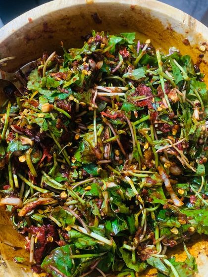 The Naga garlic and salt bring all the flavours together in this pennywort salad. It's a perfect balance of fresh, spicy, and savoury.