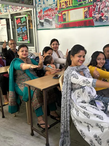 Parents and even a younger sibling enjoying the interactive session. We create a welcoming environment for the entire family to learn and grow together.
