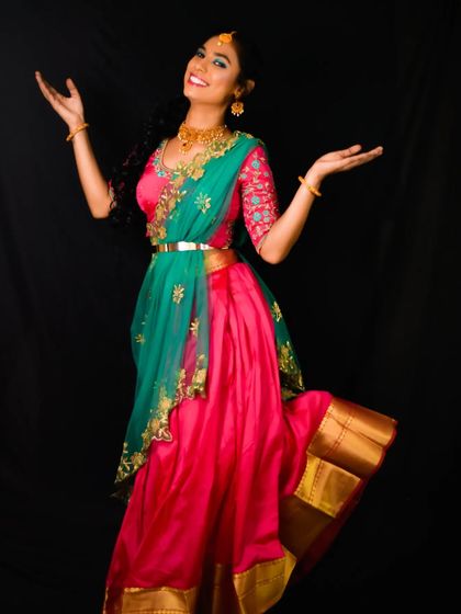 A joyful, expressive shot that captures the fun and festive spirit of the photoshoot.