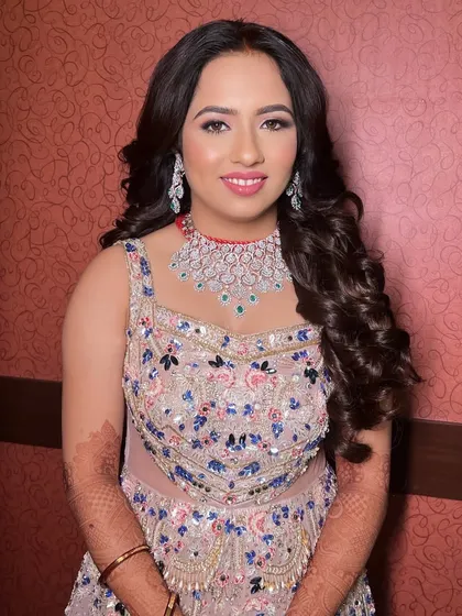 A beautiful portrait of my client for her reception. The makeup is glamorous yet sophisticated, designed to look flawless both in person and in photographs.