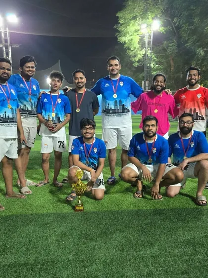 A group of players from different teams posing together after the Super Cup finals, highlighting the community spirit we build.