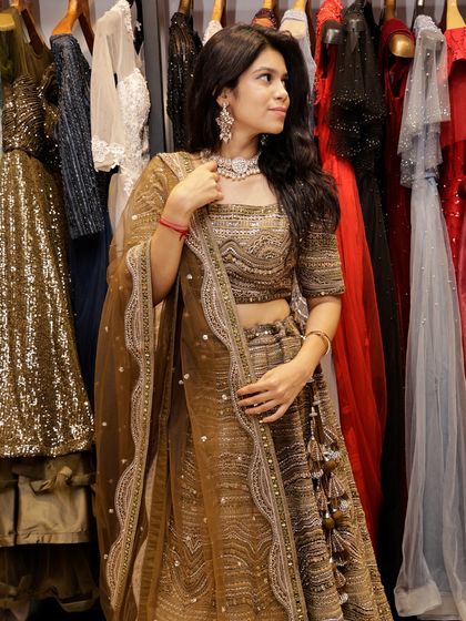 When the lehenga is as fresh as haldi, but it's mehendi green. This olive green lehenga is a perfect, queen-like choice for a Mehendi function.