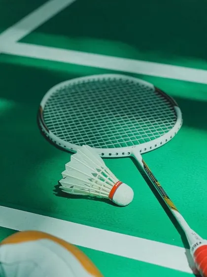 Clean court, fresh shuttle, and your favorite racket. Sometimes, that's all the therapy you need.