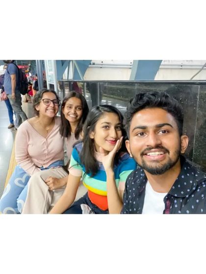 A selfie while waiting for the train on our way to a food exploration adventure.