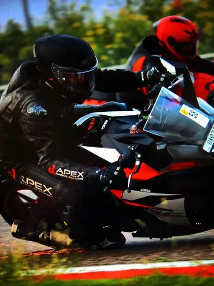 Knee down and sparks flying. This is the raw thrill of pushing your limits and finding the edge of performance on the track.