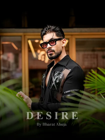 A direct gaze that matches the confidence of the shirt. This is fashion for the man who is bold, edgy, and in control.