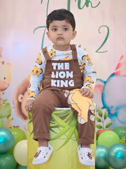 A posed portrait of the birthday boy in his 'The Lion King' themed outfit. We take time to get great solo shots of the kids amidst the party excitement.