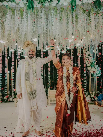 Pure celebration. A shower of petals marks the union of this wonderful couple, and my camera is right there to freeze that explosion of happiness. This is what a joy-filled wedding day looks like.