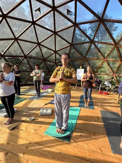 Students hold Pranamasana (Prayer Pose) at the start of our practice. This simple gesture of bringing the palms together at the heart center helps to focus the mind and set an intention for the session.
