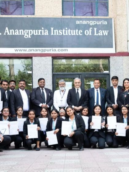 A proud group photo with all the participants and judges outside the B.S. Anangpuria Institute of Law. Events like these build a strong community of future legal professionals.