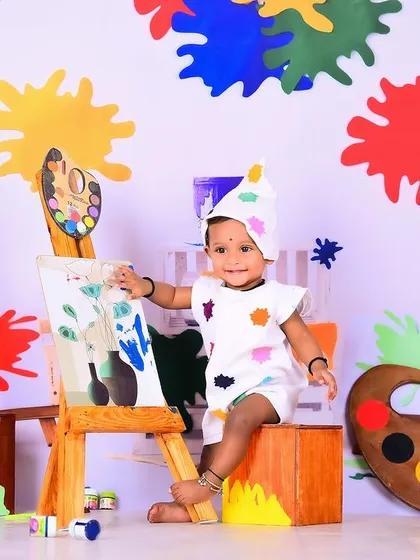 A little artist at work in a colorful paint-splatter studio. This theme is full of energy and perfect for capturing a child's creative side.
