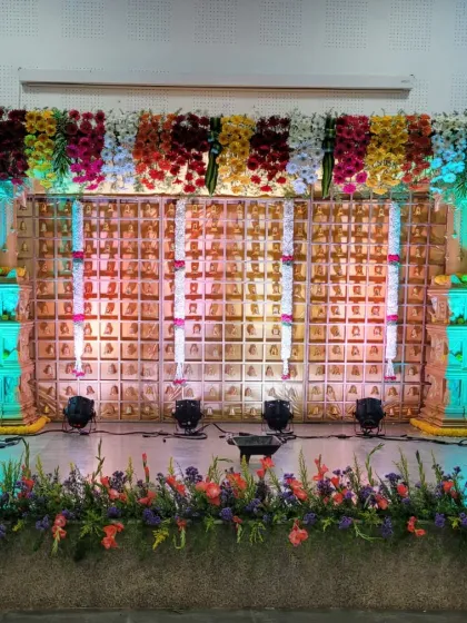 Here, the stage is lit with green and blue lights, showing how lighting can completely change the ambiance of the decor.