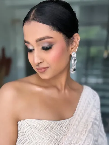 A close up of the eye makeup, showing the beautifully blended smokey shadow. This look is perfect for anyone who wants a modern yet timeless party look.
