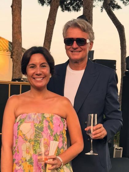 Our client from Ibiza styles a bespoke navy blazer with a simple white t-shirt, showcasing effortless European elegance.