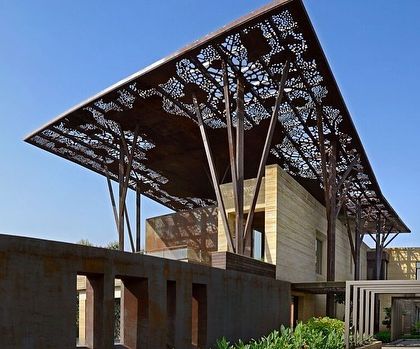 The striking facade of the award-winning Tree House. The design was praised for its innovative use of materials and its conceptual strength, drawing inspiration from the sheltering form of a tree.
