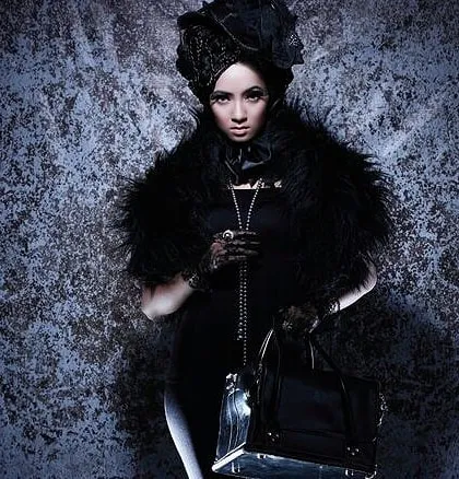 An example of a full-concept character creation for a high-fashion shoot. I designed this dark, gothic-inspired makeup look to match the intricate all-black styling and dramatic headpiece.