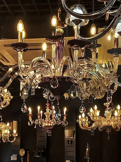 An ornate, multi-armed chandelier that blends classic design with modern elegance.