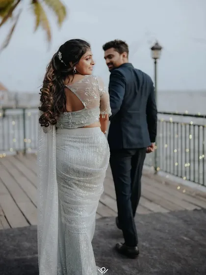 An elegant reception look. This shot shows my ability to capture both traditional ceremonies and modern, stylish evening celebrations with a cinematic feel.