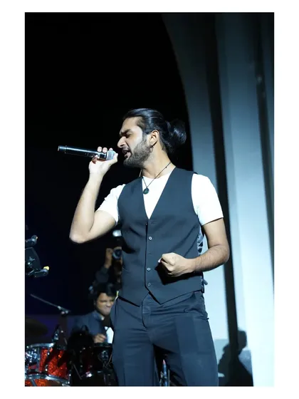 Another powerful vocal moment captured during a corporate performance.
