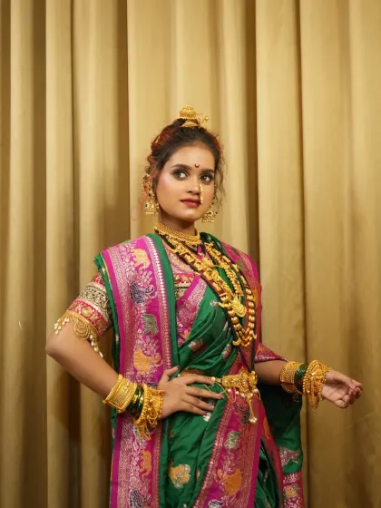 A powerful stance from the bride, showcasing her full attire and confident attitude.