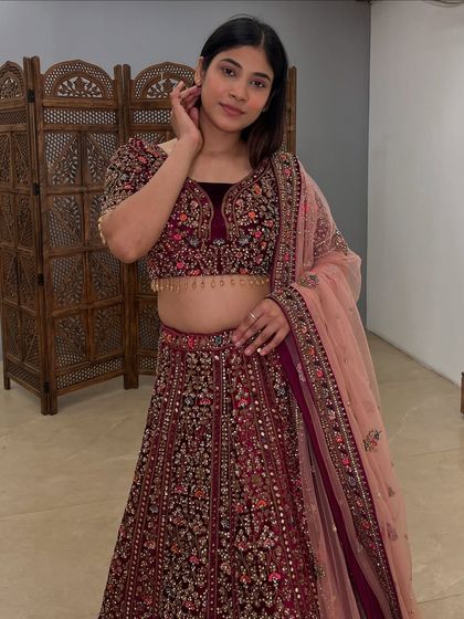 A closer view of the intricate zardozi and thread work on the velvet blouse, designed to make you shine.