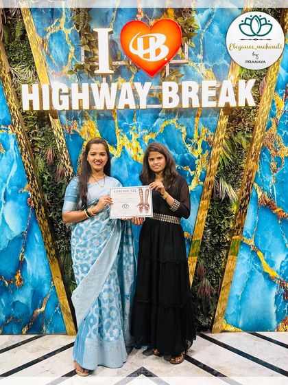 I'm so happy to present a certificate of completion to another talented student. It's a blessing to watch my students grow and achieve their goals.