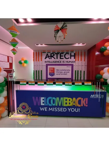 Here is a reception area I decorated for Artech's Independence Day and "Welcome Back" event. The setup includes tricolor balloon pillars and a custom-branded welcome sign, creating an inviting atmosphere for employees.