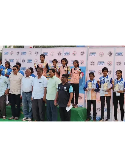 The prize distribution ceremony at the national championship, with the winning teams and officials on the podium.