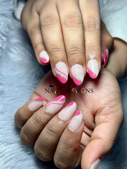 An elegant and modern design with a pink and nude base, silver glitter accents, and abstract swirls.