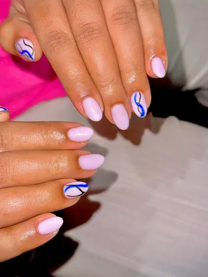 The complete set of the lavender nails with abstract liner art.