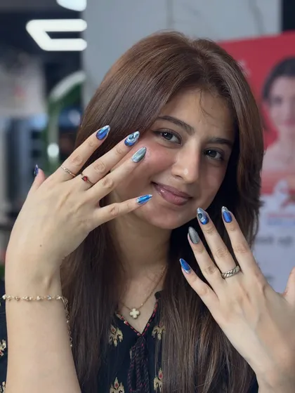 Look at that smile! This is my client showing off her new chrome and cat eye nails. My goal is always to make you feel amazing, and her happiness with the final result says it all. Happy client, happy me!