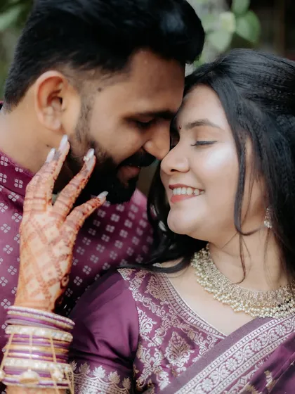 A close and intimate portrait from an engagement shoot, capturing the couple's affection and happiness.