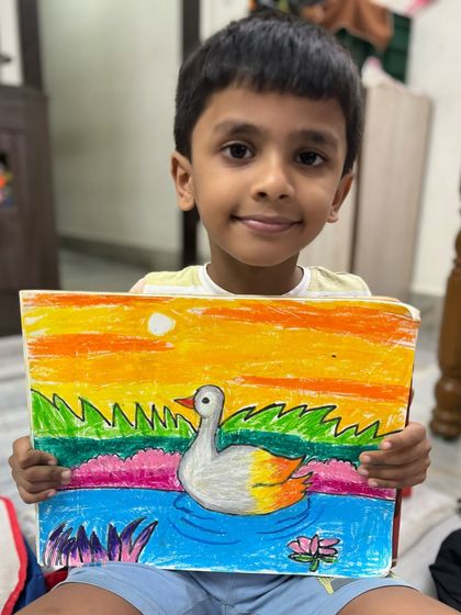 Another take on the duck at sunset, this piece by a first-grader shows how each child brings their unique touch to the same subject. I celebrate every student's individual style and progress.