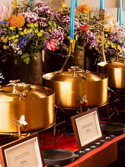 Our stunning gold butterfly chafing dishes, filled with modern Indian main courses like Junglee Maas, for a party hosted by designers Shivan & Narresh.