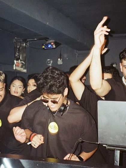 A shot from a packed weekend gig. You can feel the energy of the room, with everyone locked into the groove.