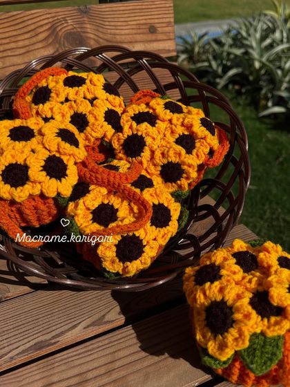 A basket full of our sunflower pot car charms. These are one of our most popular items for bulk orders and return gifts.