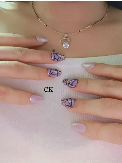 A full view of the lavender butterfly wing nails.
