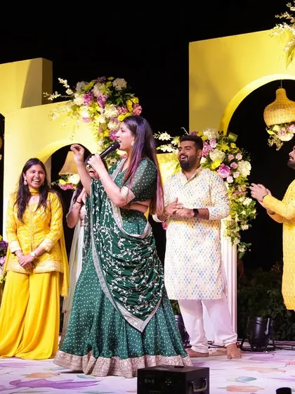 Getting the groom's friends together for a fun segment on stage. The camaraderie and friendly banter always adds a great layer of entertainment.